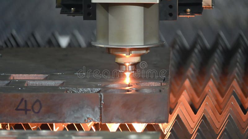Close-up scene the fiber laser cutting machine cutting thick material part