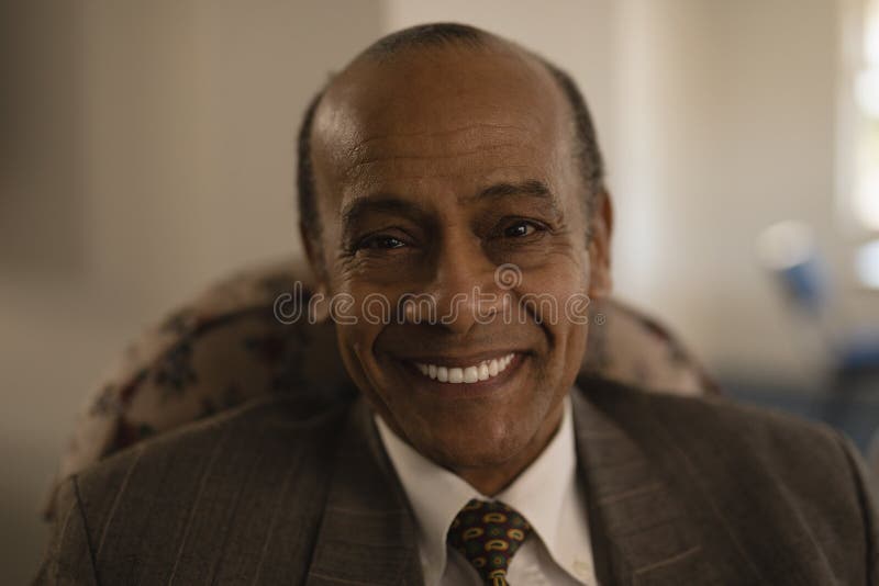 Close-up of senior man looking at camera in nursing home royalty free stock images Close-up of senior man looking at camera in nursing home royalty free stock images