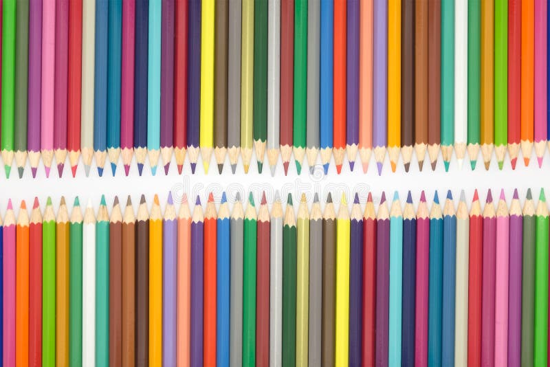 Close up set of multiple colour wooden pencils on white background