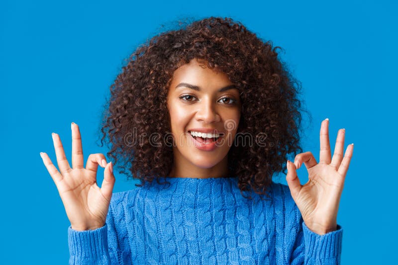 Close-up shot assured and assertive, confident young african american woman say everything under control, alright all royalty free stock photos Close-up shot assured and assertive, confident young african american woman say everything under control, alright all royalty free stock photos