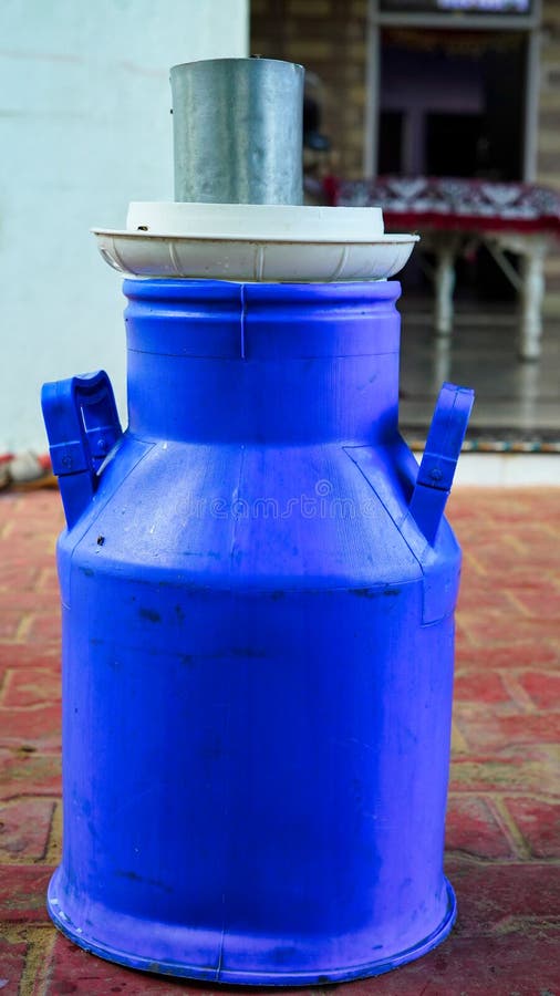 Chennai gal oiling her milk cans