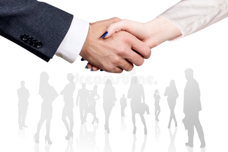 Close-up shot on business handshake over business people croud background. royalty free stock image Close-up shot on business handshake over business people croud background. royalty free stock image