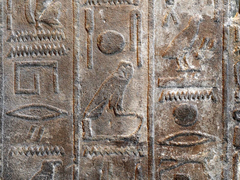 Close up shot of Egyptian hieroglyphics carved into stone royalty free stock photography Close up shot of Egyptian hieroglyphics carved into stone royalty free stock photography