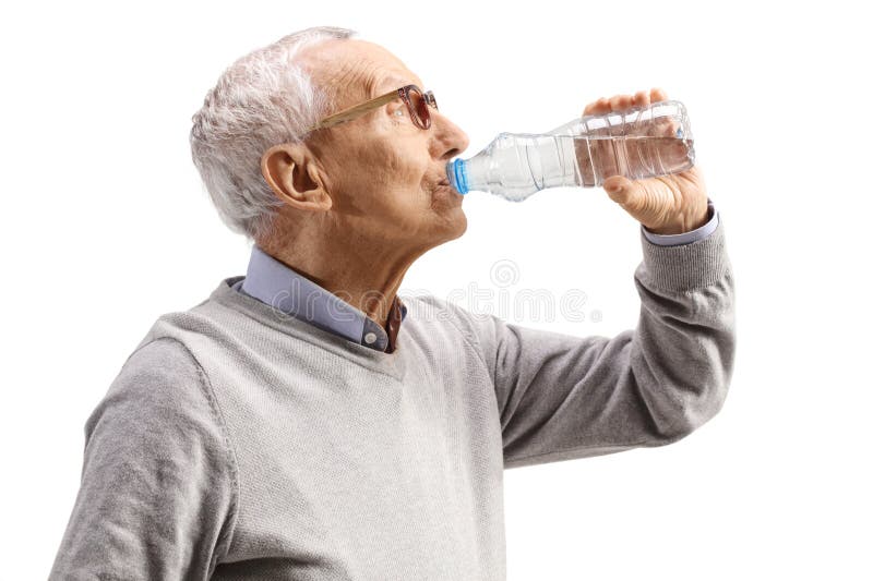Close up shot of an elderly man drinking water stock image
