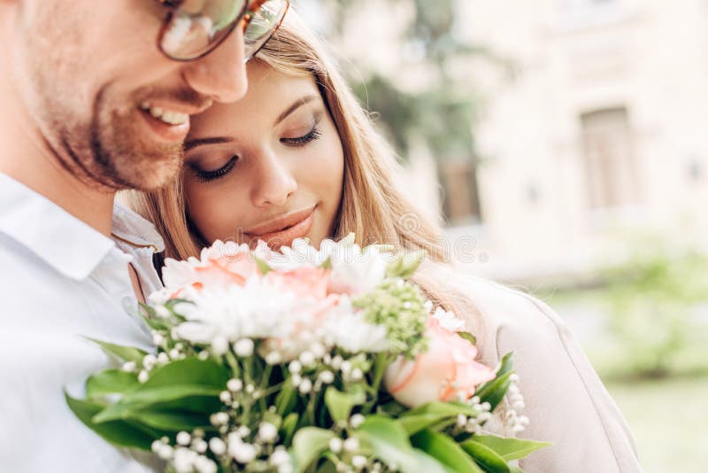 Close-up Shot of Happy Young Couple with Bouquet Stock Image - Image of ...