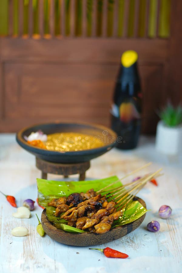Indonesian Chicken Satay with Delicious Peanut Sauce Stock Photo