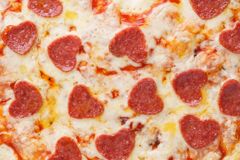 Close-up shot of pizza with heart shaped pepperoni. royalty free stock image Close-up shot of pizza with heart shaped pepperoni. royalty free stock image