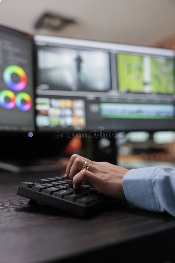 Close up shot of video graphic editor using specialized software to edit movie footage royalty free stock photo