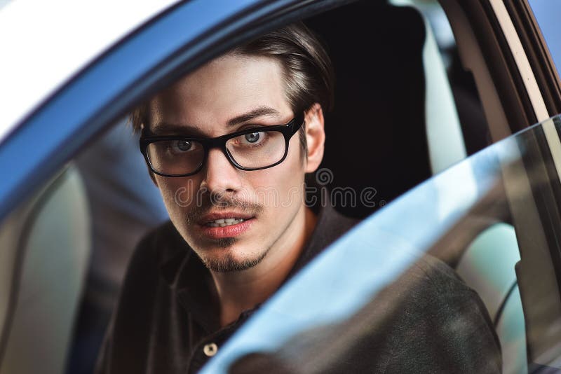 Close Up Side Portrait of Happy Caucasian Man Driving Car. Stock Photo ...