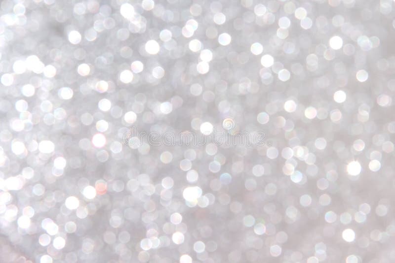 Silver sparkle glitter abstract bright texture , white or gray background
