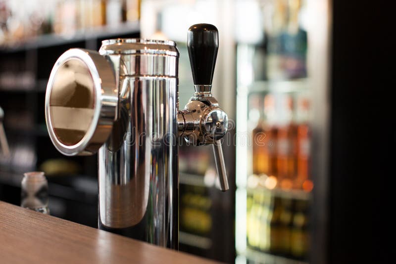 Close up of single tap chrome draft beer tower