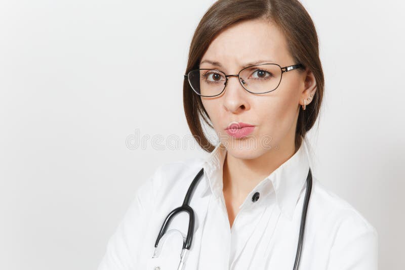 Close up skeptical sad brunette beautiful young doctor woman with stethoscope, glasses isolated on white background royalty free stock photography Close up skeptical sad brunette beautiful young doctor woman with stethoscope, glasses isolated on white background royalty free stock photography