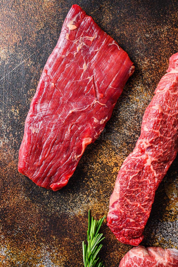 Close Up Skirt Steak, Flank Steak, Cut Near Denver Alternative Beef Steak a Rustic Metall