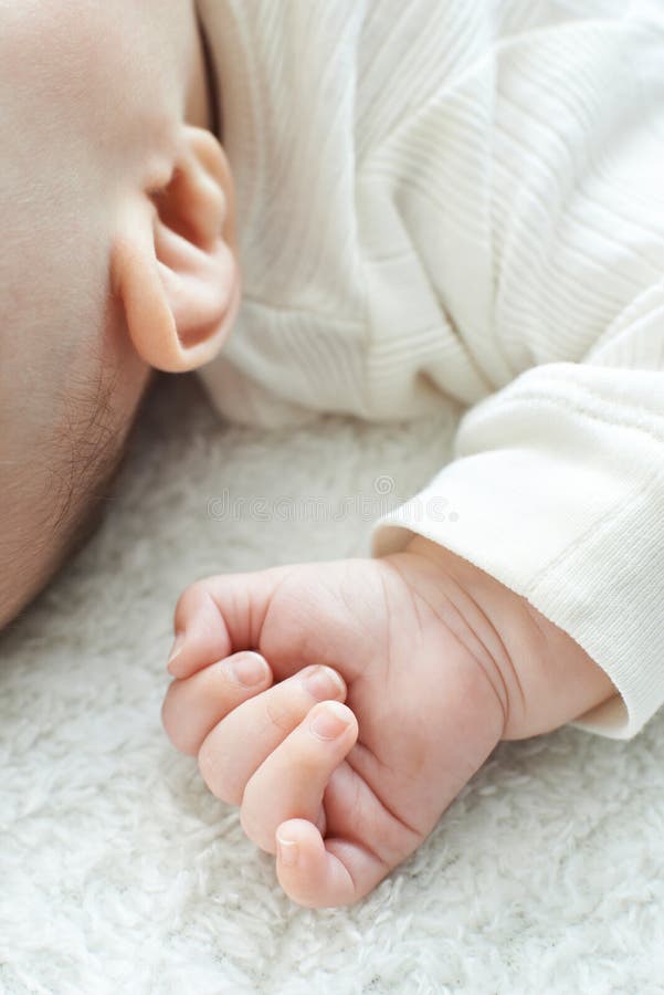 Close Up Of Sleeping Baby Girl's Hand stock image Close Up Of Sleeping Baby Girl's Hand stock image