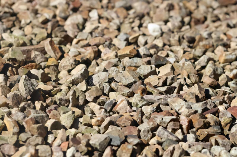 A close up of small stones with variety textures and colors imagen de archivo
