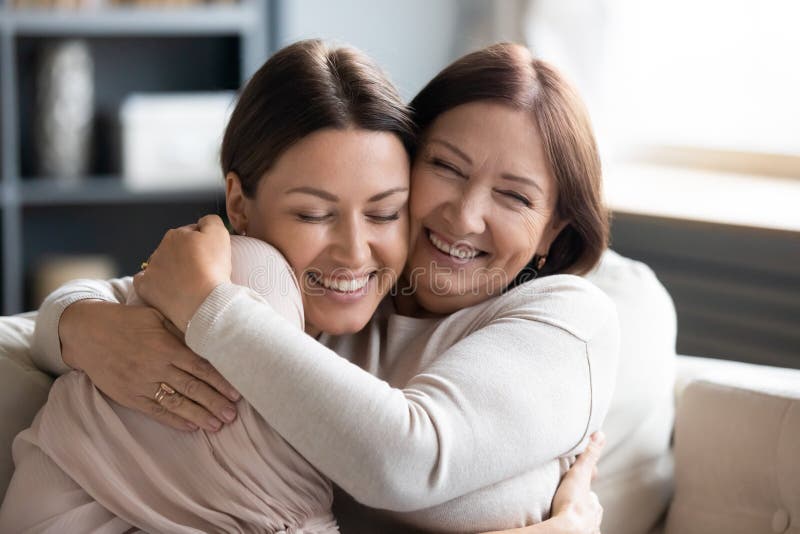 Close Up Smiling Grownup Daughter And Mature Mother Cuddling Stock Image Image Of Mature 