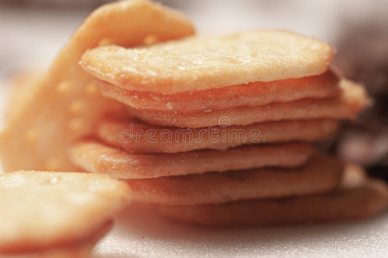 Closeup of a Snack with Cheese. a Stack of Dry Cookies. Stock Photo