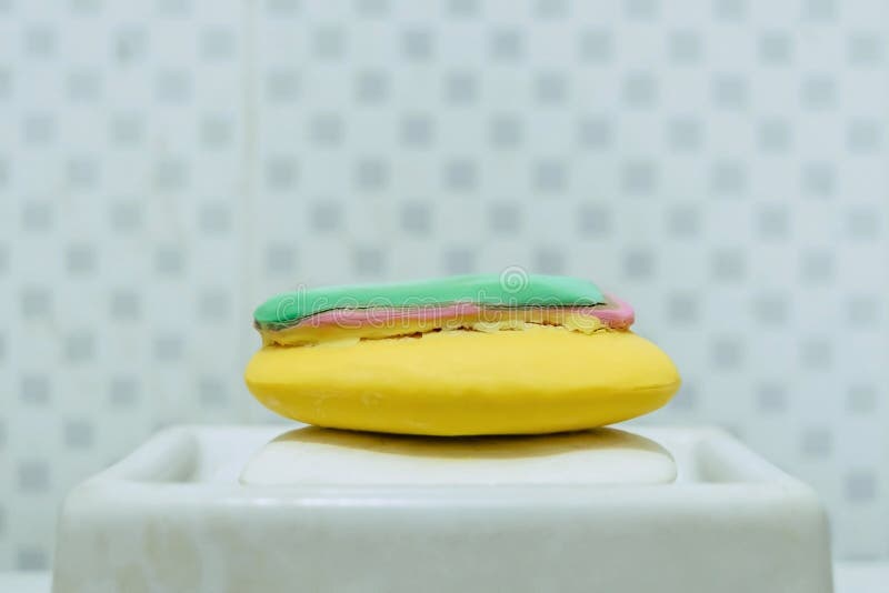 Layer of Soap and Colorful Soap in the Toilet and Bathroom. Stock Photo
