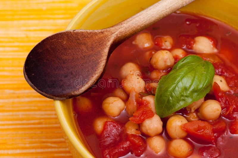 Closeup of a Soup with Peas, Tomatoes and Basil Stock Image Image of orange, legumes 25492819