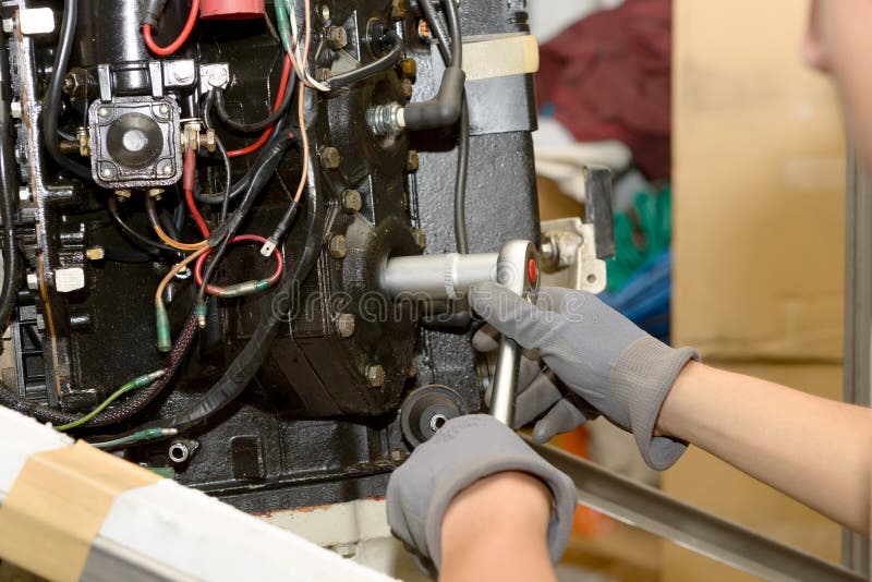 Spark plug replacement work stock photo