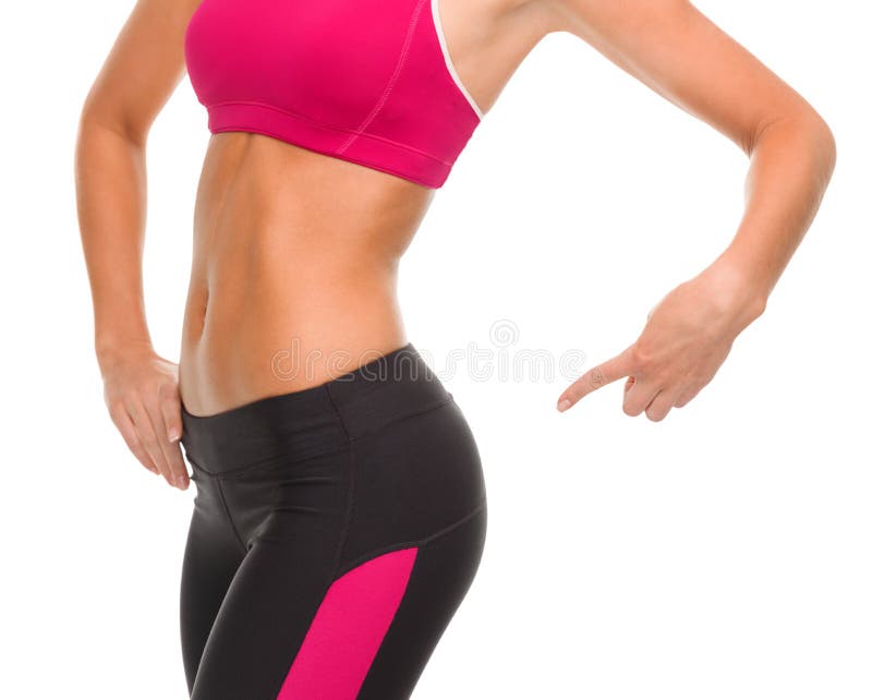 Close up of sporty woman pointing at her buttocks stock photography Close up of sporty woman pointing at her buttocks stock photography