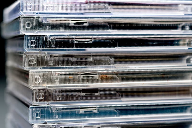 A close up of a stack of CDs