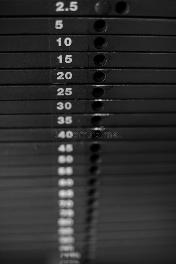 Close-up of stack metal weights in gym equipment royalty free stock photo