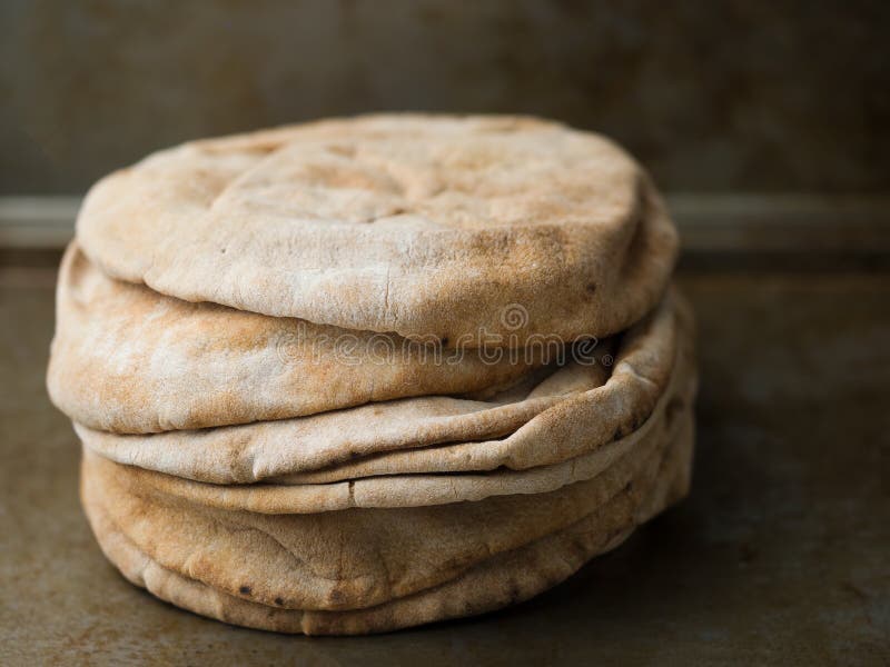 Stack of rustic pita bread stock photo. Image of carbs 113985408