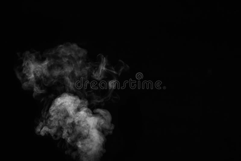 White horizontal steam, smoke isolated on black background. a