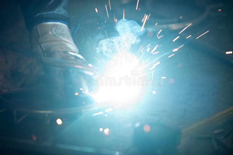 Close Up of the Steel Welding Process. Work in the Heavy Steel Industry