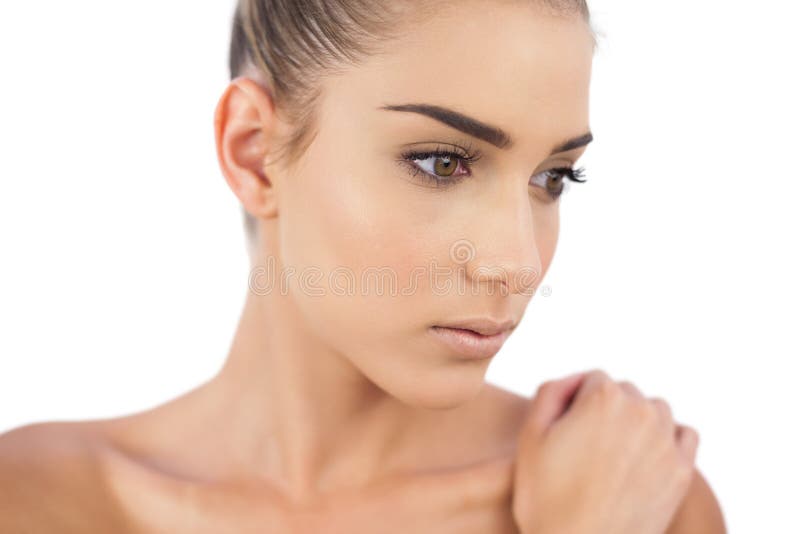 Close up of a stern woman looking away