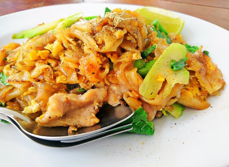 Close up Stir fried flat noodle and pork Thai Food royalty free stock image Close up Stir fried flat noodle and pork Thai Food royalty free stock image