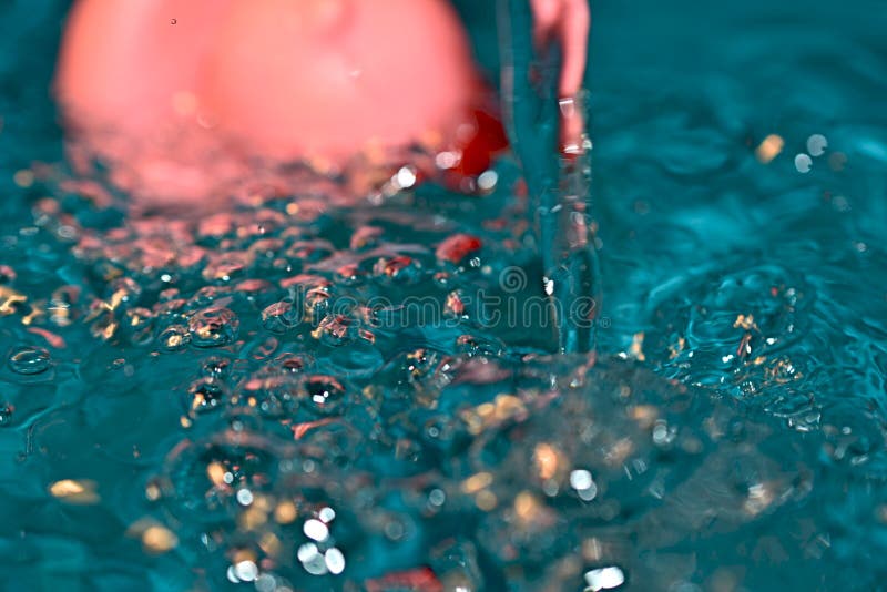 Closeup of a Surface of Water Covered with Bubbles Stock Photo Image