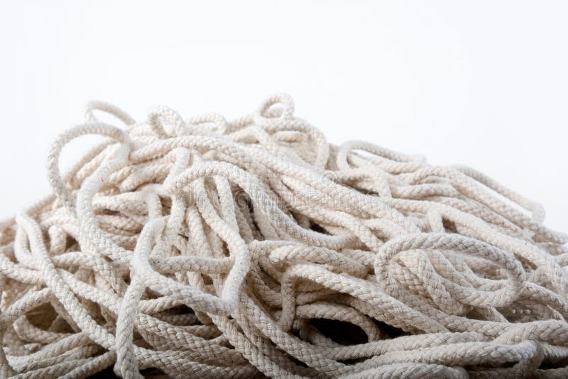 Close up of tangled rope part background on white