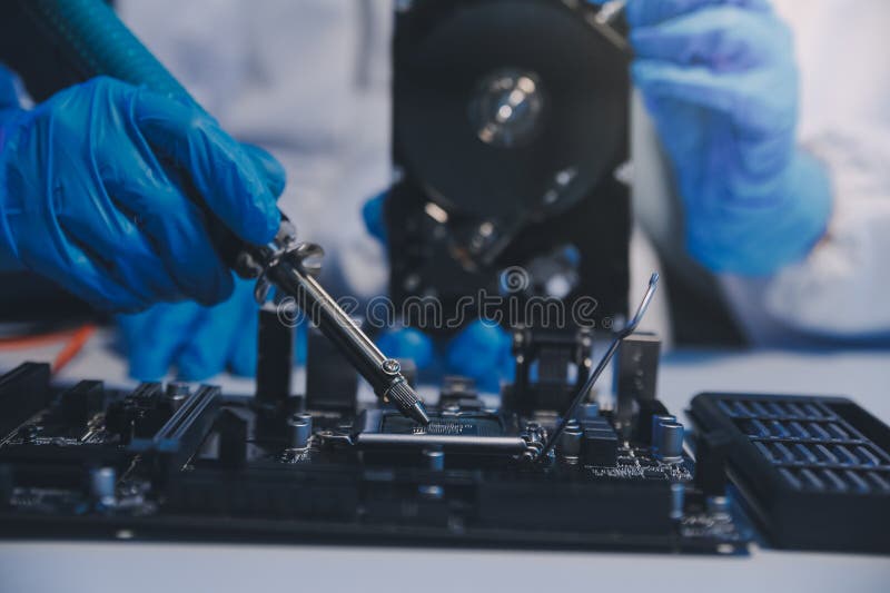 Close up of Technician measuring voltage electronic circuit board television, Service after sale fix electric equipment within insurance. Voltage lab stock images, royalty-free photos and pictures