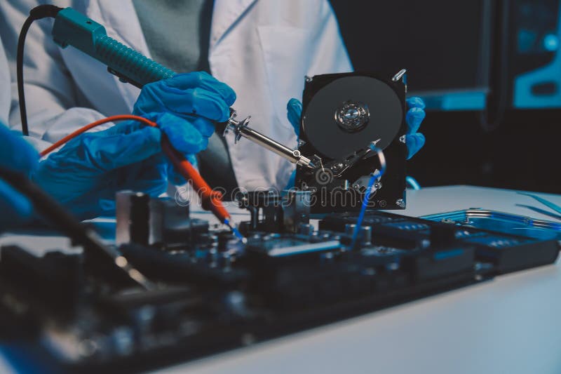 Close up of Technician measuring voltage electronic circuit board television, Service after sale fix electric equipment within insurance. Voltage lab stock images, royalty-free photos and pictures
