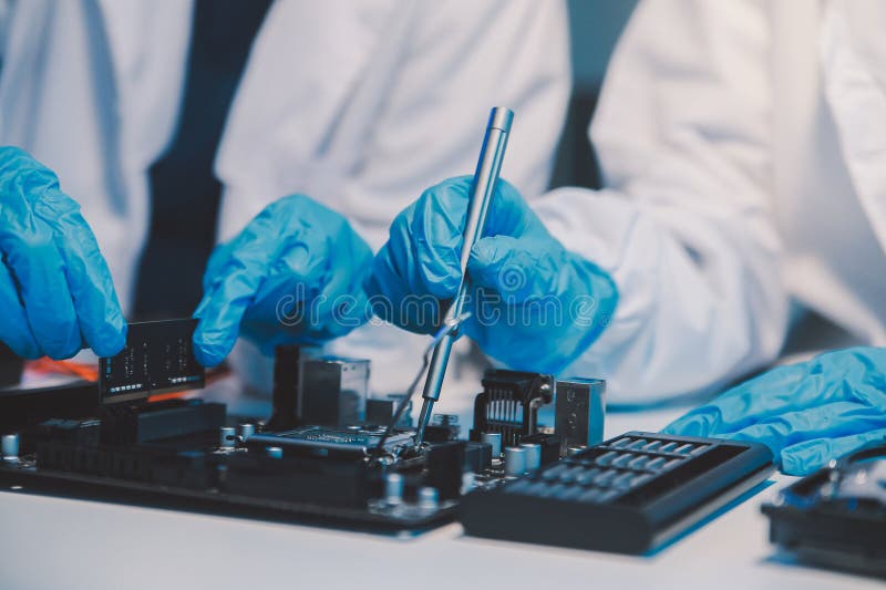 Close up of Technician measuring voltage electronic circuit board television, Service after sale fix electric equipment within insurance. Voltage lab stock images, royalty-free photos and pictures