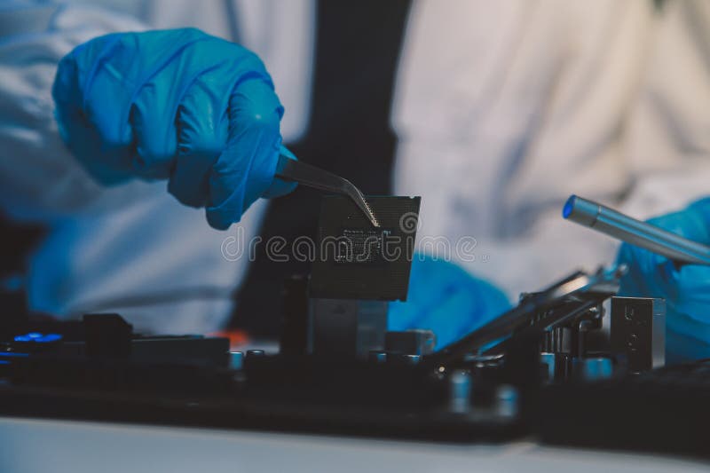 Close up of Technician measuring voltage electronic circuit board television, Service after sale fix electric equipment within insurance. Voltage lab stock images, royalty-free photos and pictures