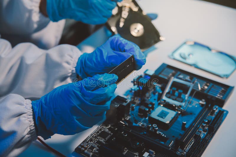 Close up of Technician measuring voltage electronic circuit board television, Service after sale fix electric equipment within insurance. Voltage lab stock images, royalty-free photos and pictures