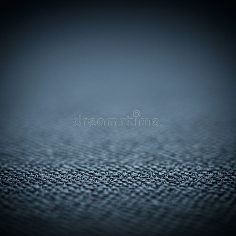 Close-up of a textured surface with a uniform, dark blue pattern. The surface appears vector illustration
