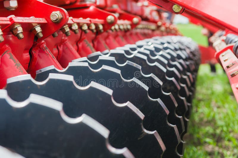 Close up thick agricultural metal wheels disks