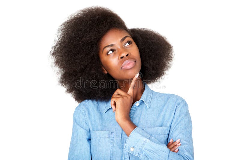 Close up horizontal portrait of thinking young black woman with afro looking up at copy space. Close up horizontal portrait of thinking young black woman with afro looking up at copy space