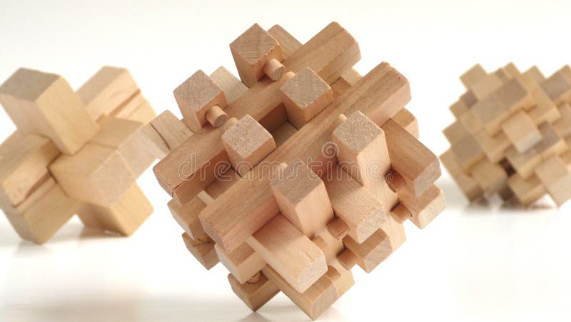 Three-Dimensional Wooden Puzzle Being Constructed by Hands Stock Photo -  Image of hand, educational: 217732902