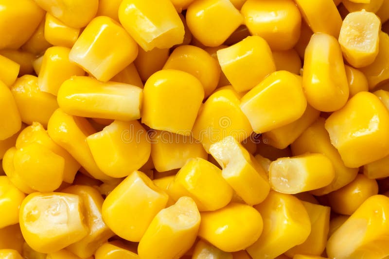 Close-up of tinned sweetcorn from above. stock photo Close-up of tinned sweetcorn from above. stock photo