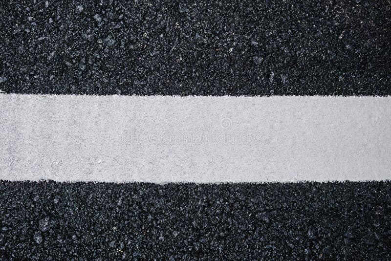 Top view close up texture background of asphalt road with white line royalty free stock images Top view close up texture background of asphalt road with white line royalty free stock images