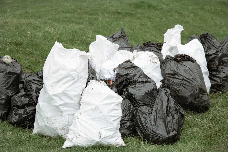 Free Photo  Close up of trash bags filled with trash after cleaning the  environment