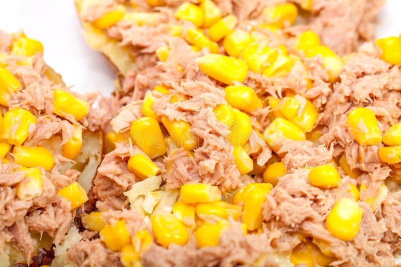 Close up of tuna and sweetcorn on baked potato. stock images Close up of tuna and sweetcorn on baked potato. stock images