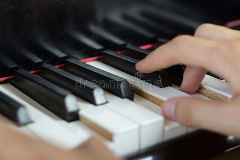 Close Up of Two Hands Playing Piano Stock Image Image of black, field