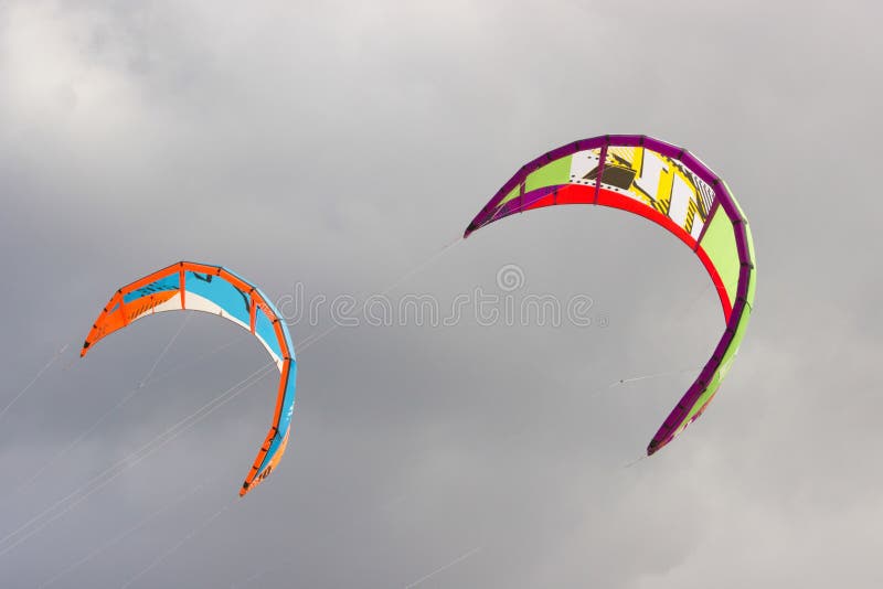 Close Up Of Two Kites In The Sky Stock Image Image of speed, clouds