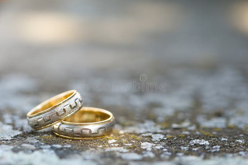 Gold wedding rings with decoration · Free Stock Photo